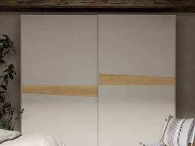 Armadio con ante scorrevoli in laccato opaco con inserto asimmetrico in melaminico Flò di SantaLucia