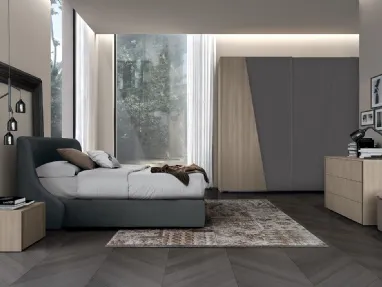 Letto in tessuto imbottito con testiera Golf Snug di Colombini Casa