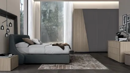 Letto in tessuto imbottito con testiera Golf Snug di Colombini Casa