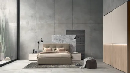 Letto in tessuto imbottito con testiera Vitalyty Float di Colombini Casa