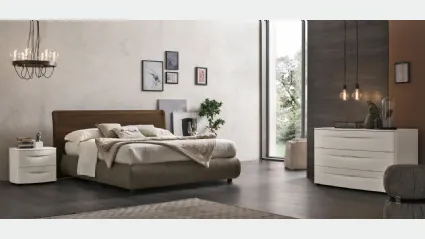 Letto Prado con testiera in Rovere e giroletto con contenitore in ecopelle di Tomasella