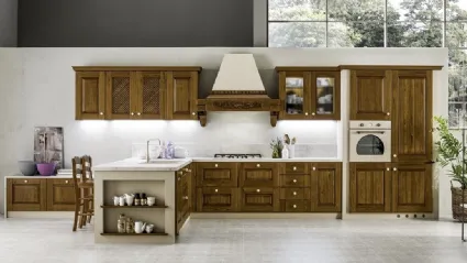 Cucina in Muratura con penisola in legno tinto Noce Nora 07 di Arrex